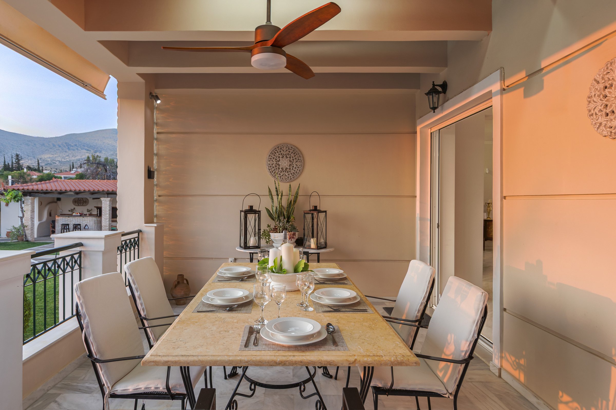 Veranda dining at twilight, Renko Royal Villa